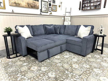 Sectional sofa in a living room setting with decorative elements.